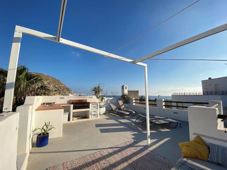 The roof terrace has a large BBQ and kitchen area. 