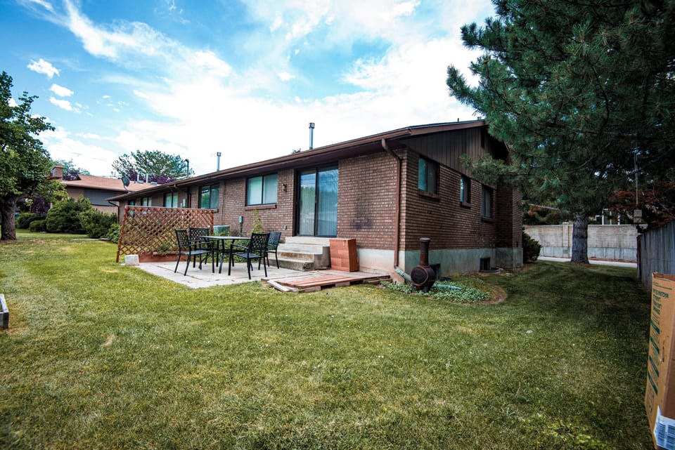 Beautiful home situated in a quiet neighborhood with a spacious yard. Perfect for morning coffee or evening relaxation.