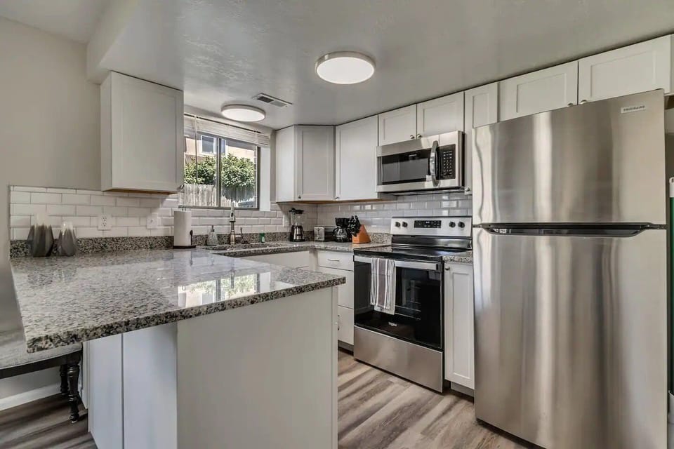 Modern island setup with plenty of counter space and storage.