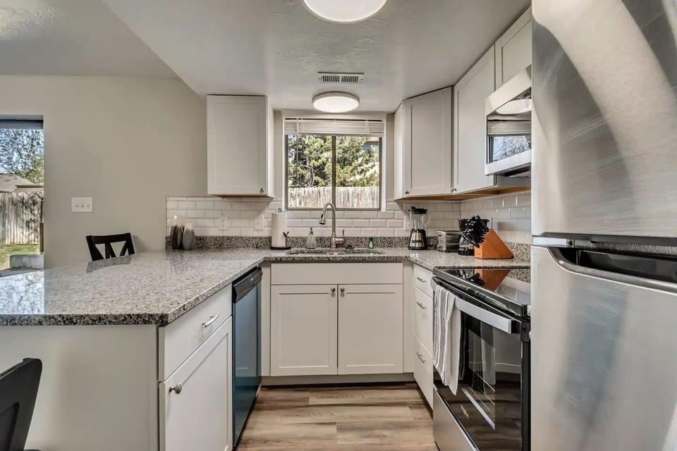 Fully-equipped with stainless steel appliances and granite counters—cook like home.