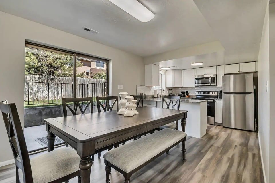 Comfortable seating for 8 with a beautiful table and bench setup.