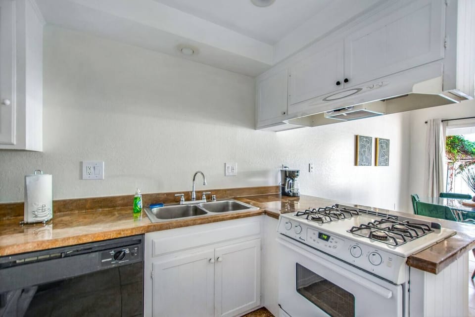 Fully equipped kitchen with all essentials for home-cooked meals.