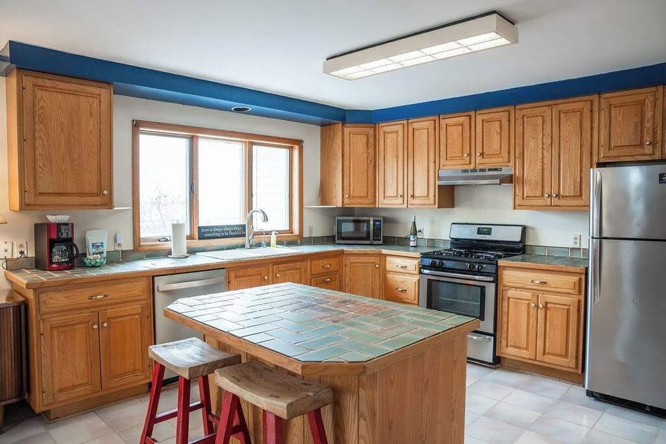 A well-stocked kitchen with plenty of counter space for cooking meals together.