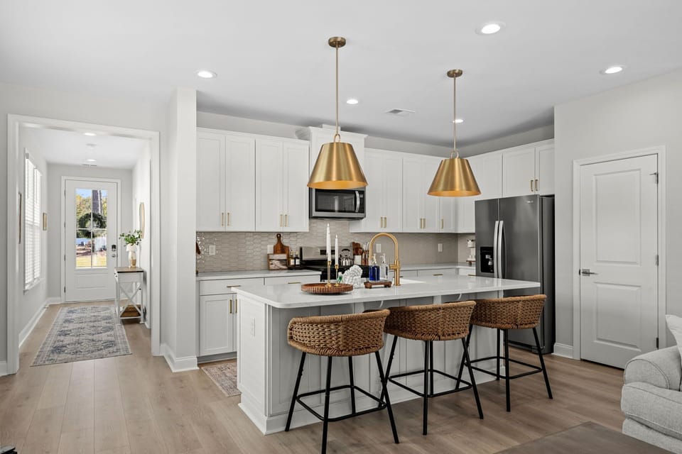 Modern kitchen with a breakfast bar for three.