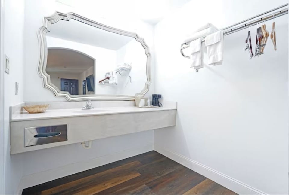 Organize easily with open storage and hang-up space nearby.