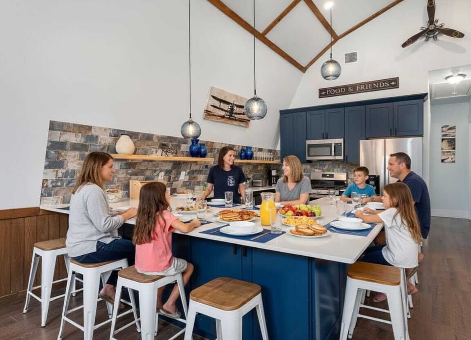 Gather around the kitchen island — plenty of room for the whole family to dine together.
