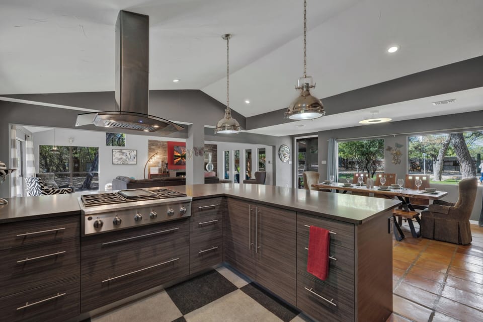 Modern kitchen with sleek appliances, ample counter space, and a welcoming atmosphere.