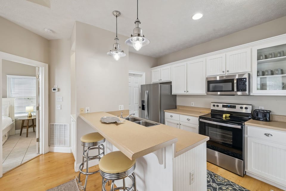 Offering Stainless Steel Appliances & Bar Seating for 2