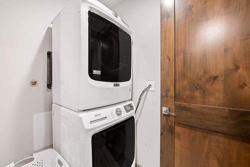 Washer and dryer, located upstairs across from the loft bedroom
