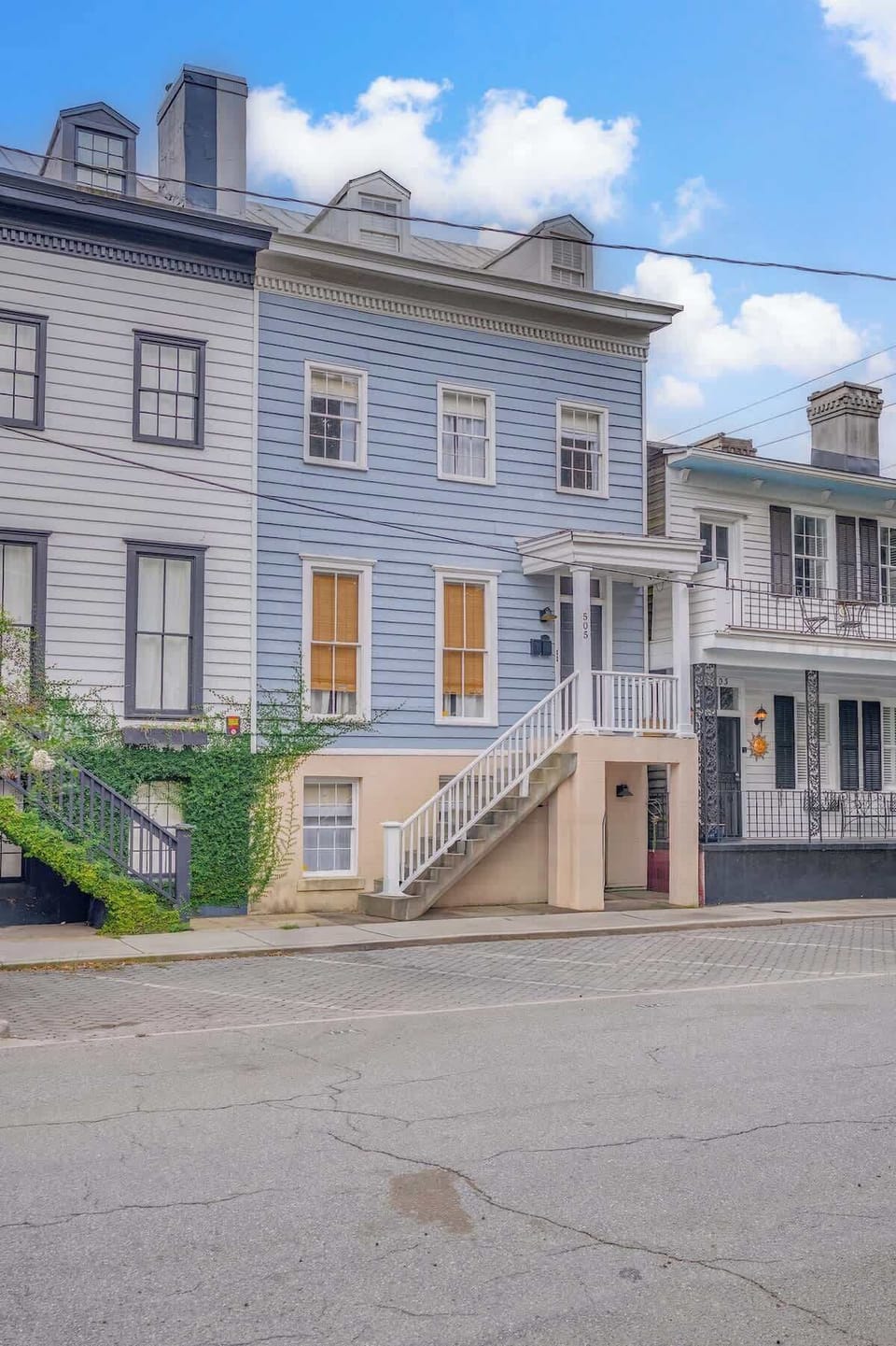 This three-story townhouse combines classic charm with modern touches. Perfectly situated for exploring the city, it’s a welcoming spot you’ll love coming home to.