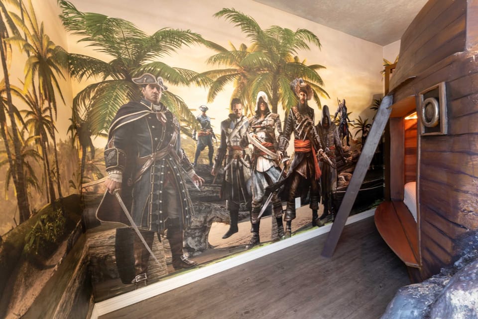 Immerse yourself in a thrilling pirate adventure with stunning wall murals and a unique ship bed