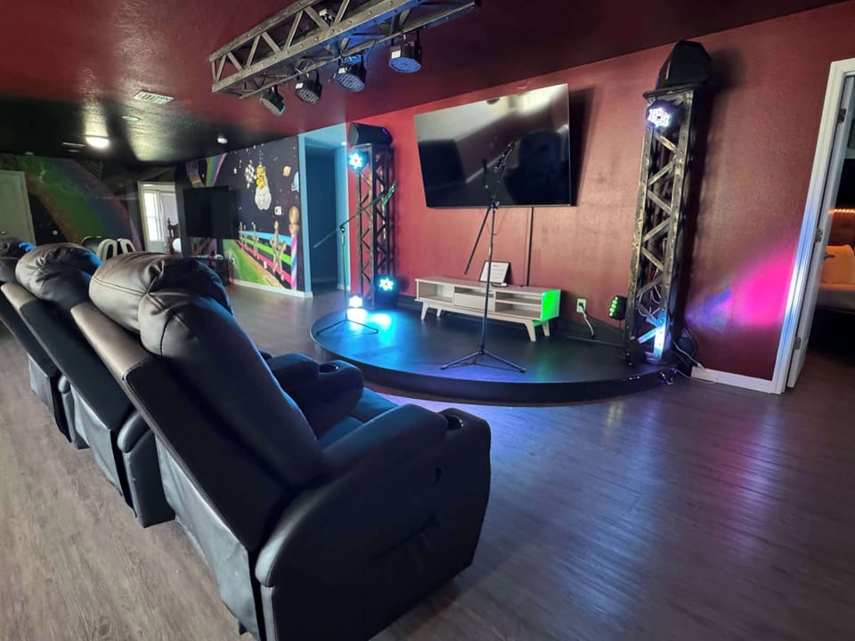 Experience ultimate fun in our entertainment loft, featuring a karaoke stage, gaming area, and plush recliners