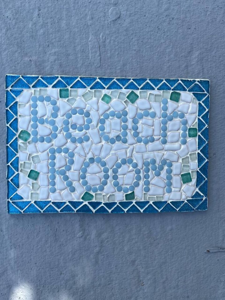 Beach Room sign outside the entrance