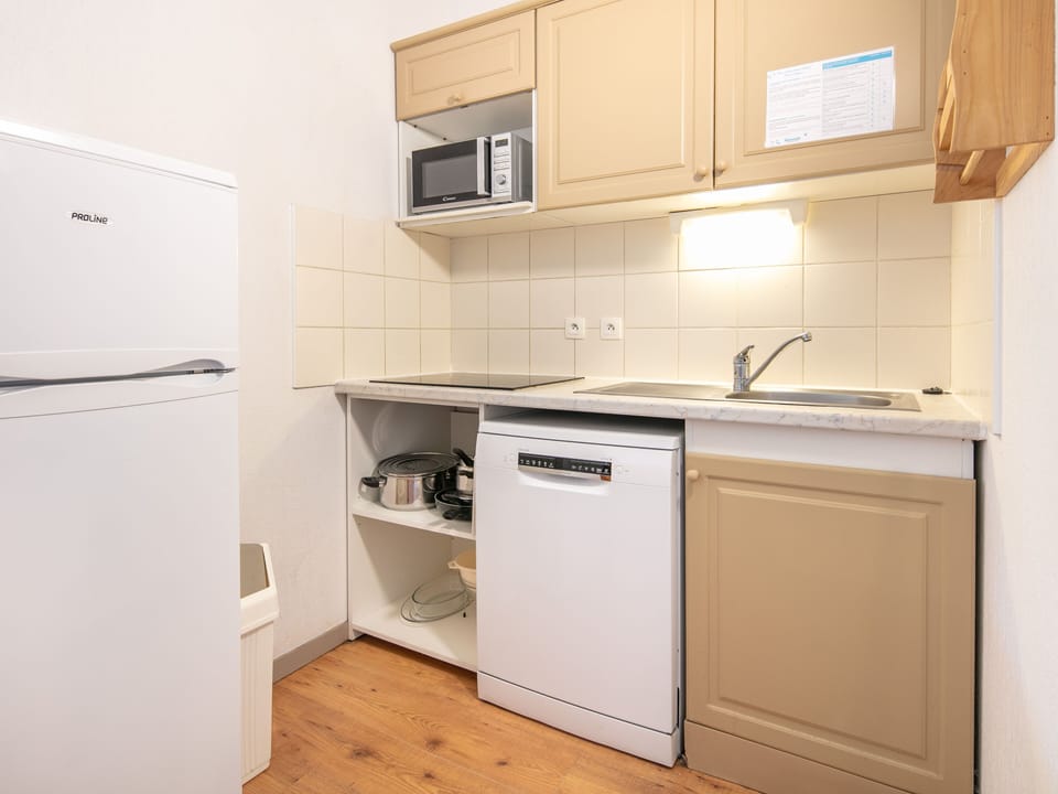 Practical kitchenette with modern appliances, perfect for easy self-catering during your stay.