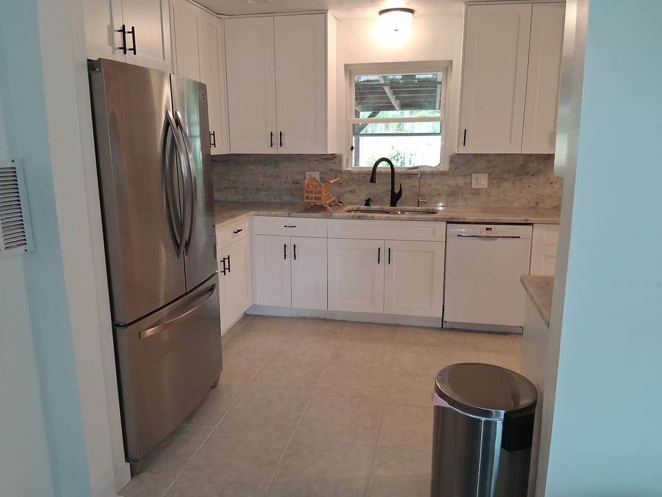 Kitchen with basic cooking supplies. 