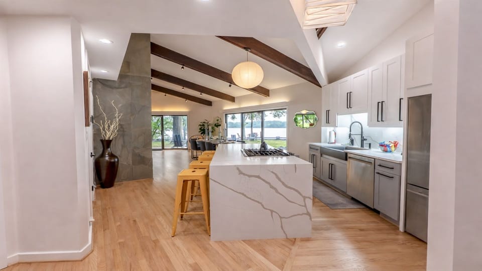 Chef's Kitchen — Waterfall Marble Island, Premium Appliances, Keurig, Seats Group of 10