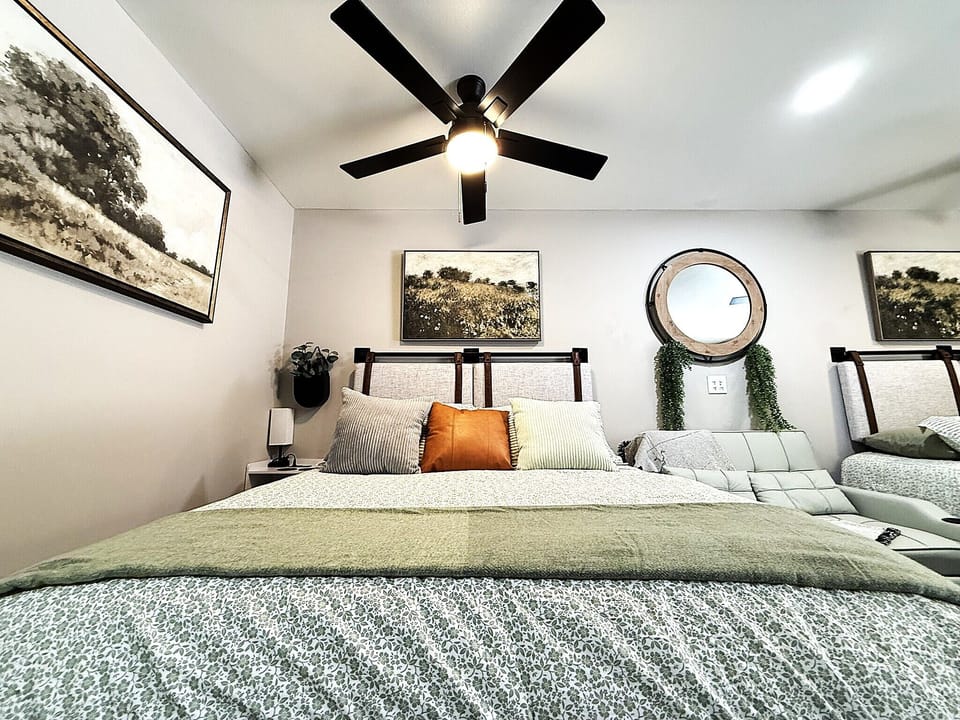 Soft sheets, cozy layers, and the perfect excuse to sleep in — this is your Branson recharge zone.