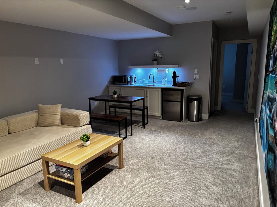 Living room/kitchenette in your private unit Raccoon.