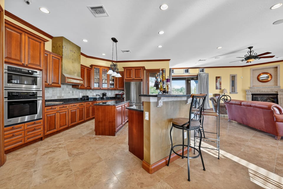 Spacious prep areas paired with elegant Tuscan finishes.