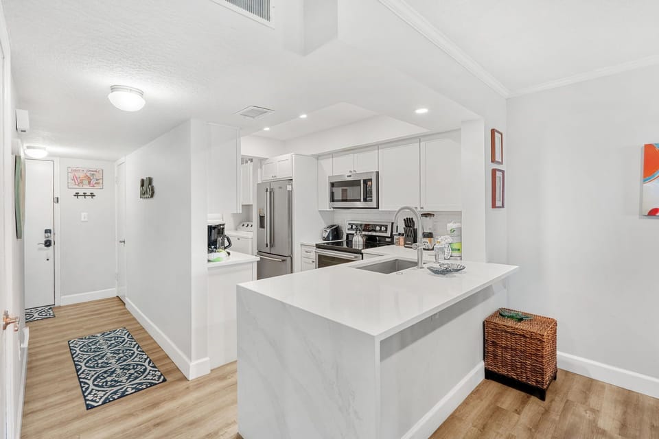 Sleek & modern kitchen with an island