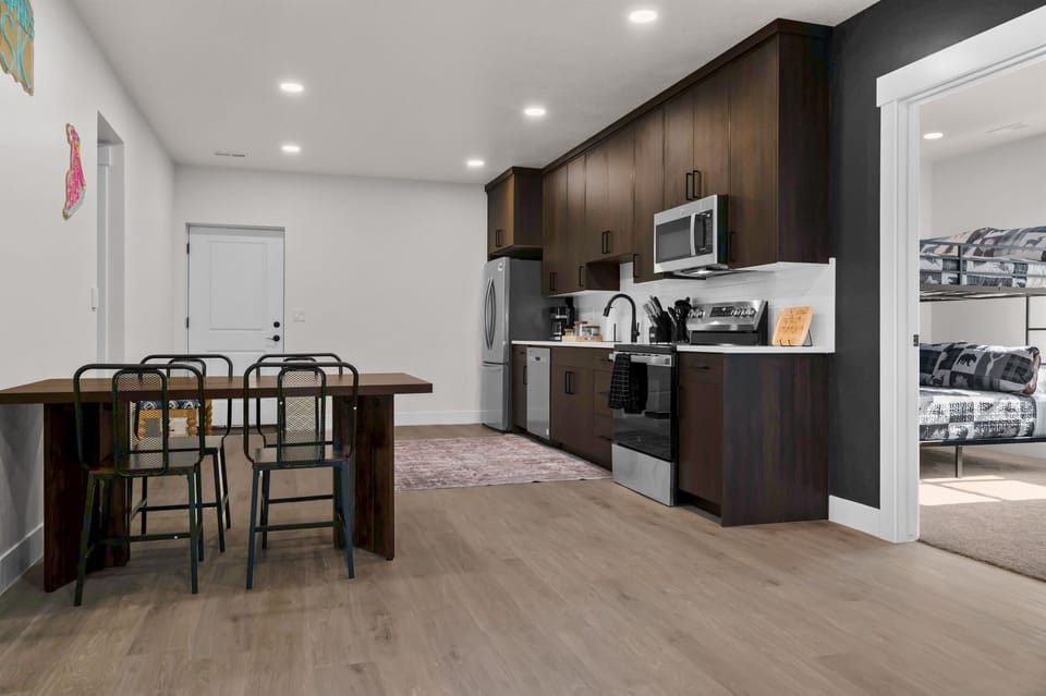 Dining area with modern décor and seating for six guests.