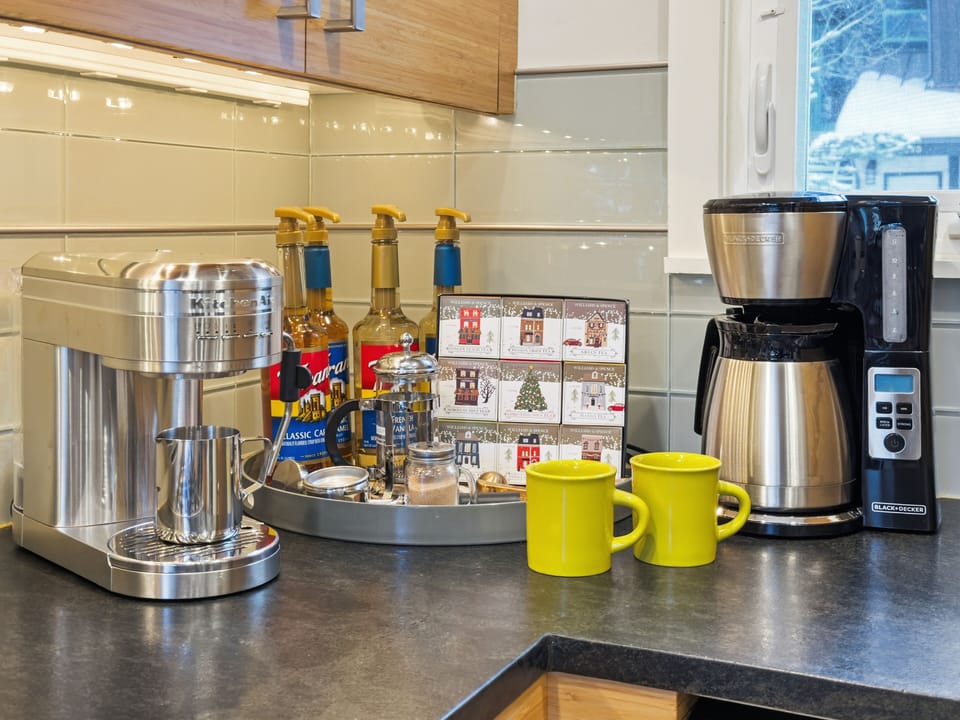 Coffee bar with coffee and tea. Drip, Expresso, Kuerig and French press. 