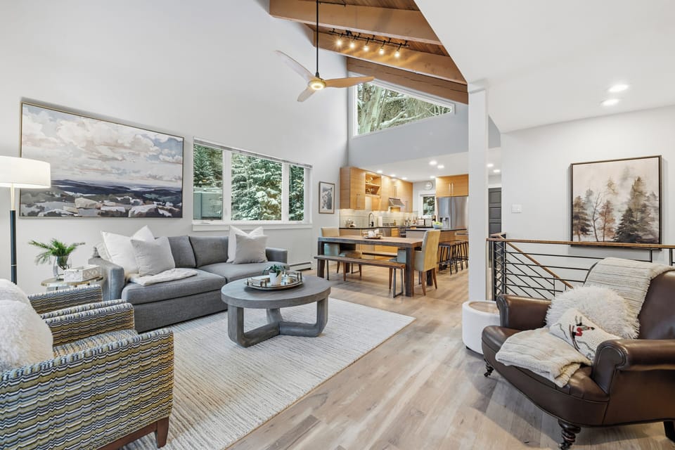 Spacious living area with woodburning fireplace and Smart TV