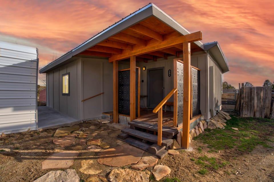 Front porch features privacy and wind screens 
