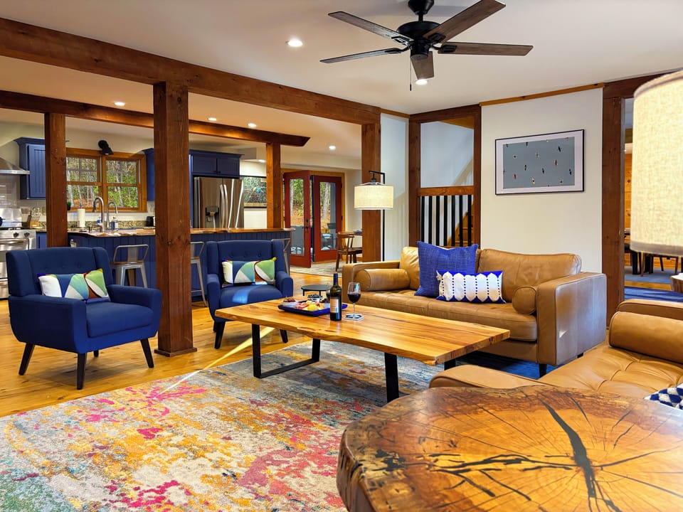 Gather in the living room, complete with a warm fireplace and games—perfect for relaxing after your Blue Ridge adventures.