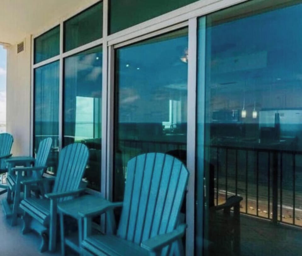 Enjoy morning coffee or SpaceX launches from your private balcony overlooking the coastline.