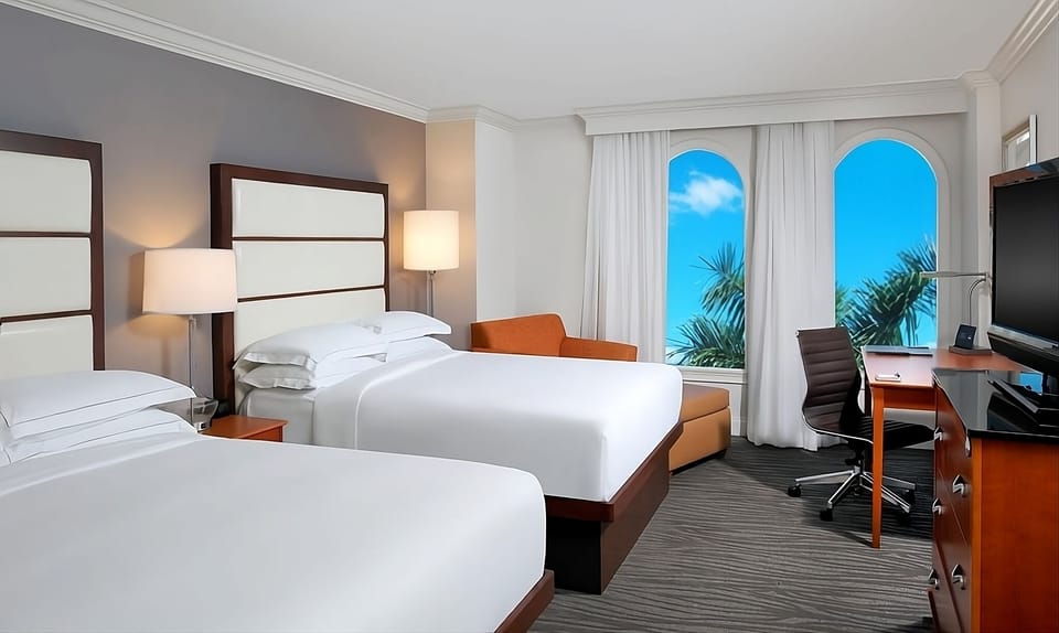 Wake up to bright views and sink into plush beds.