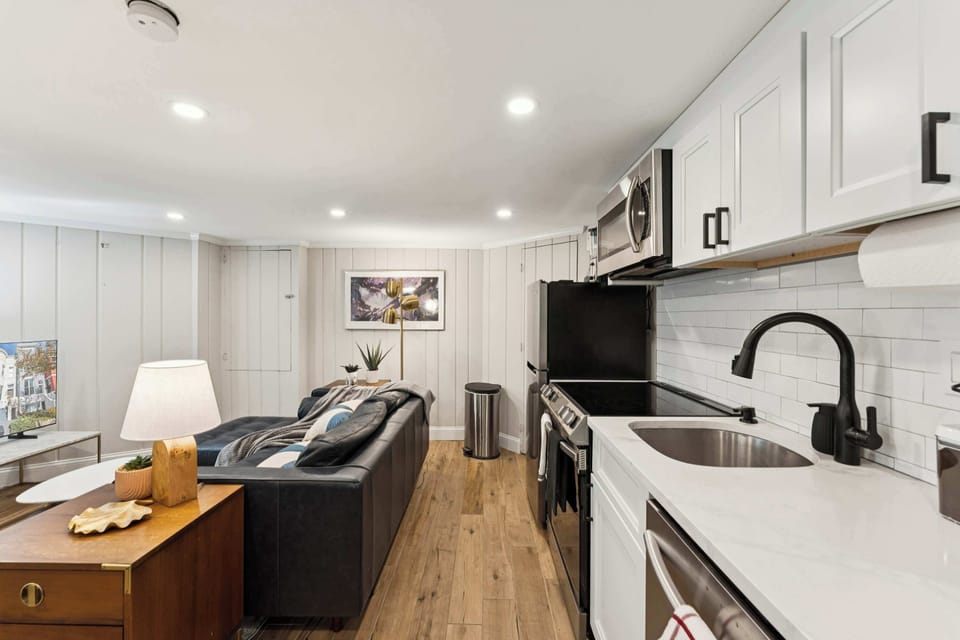 Kitchen with full size stove and dishwasher