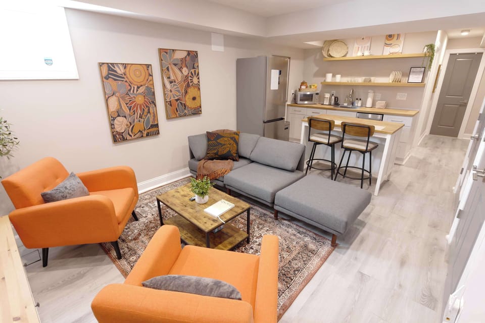Our home includes double living room space! One on the main level and the other in our lower level!