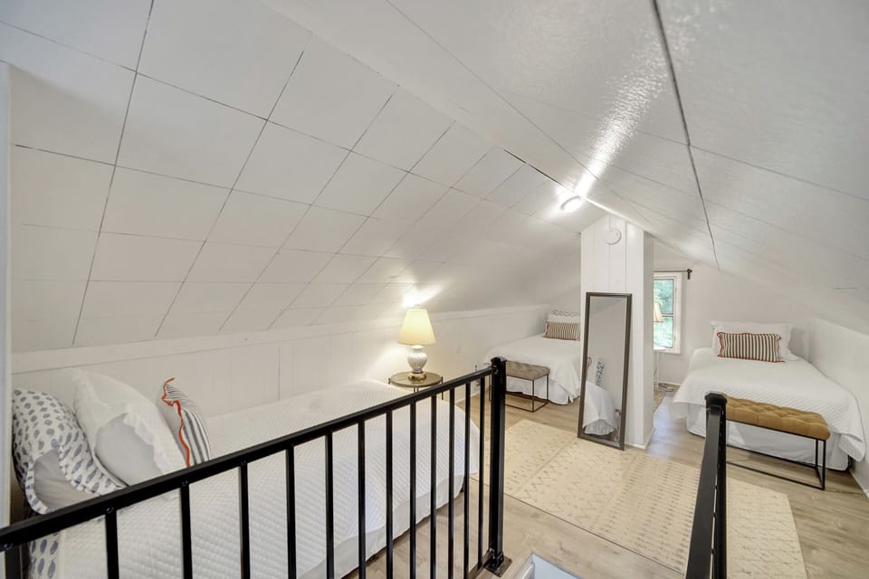 Bedroom 3 has two singles and one double bed. 