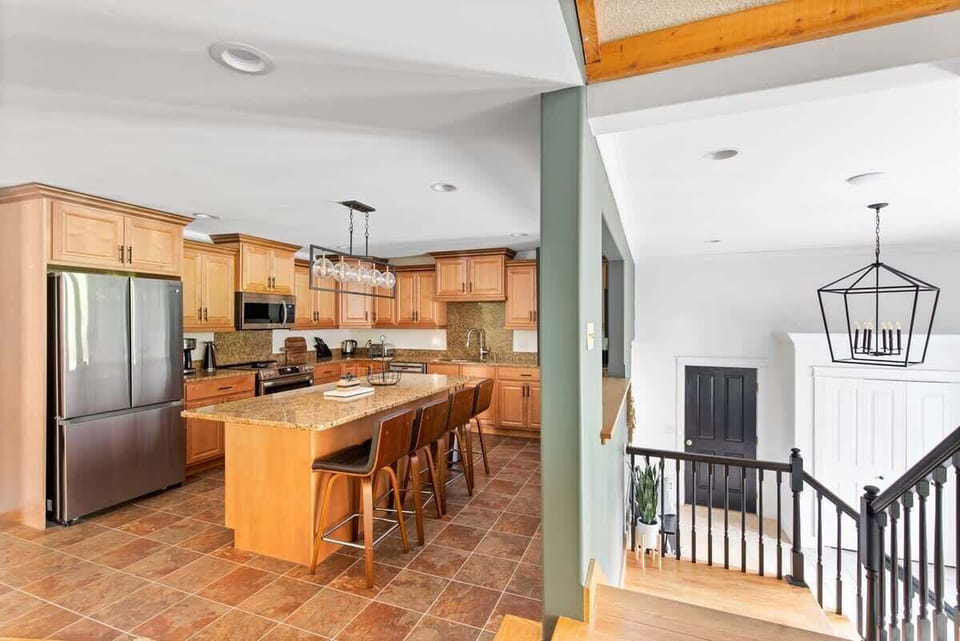 Brand new appliances in this large kitchen. Cook pancakes for the kids at the breakfast bar!