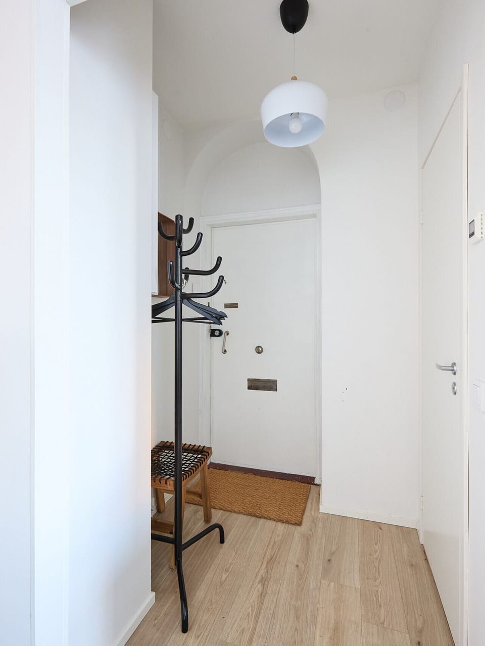 Keep your outerwear organized with the convenient hallway storage, located right by the entrance for easy access as you come and go.