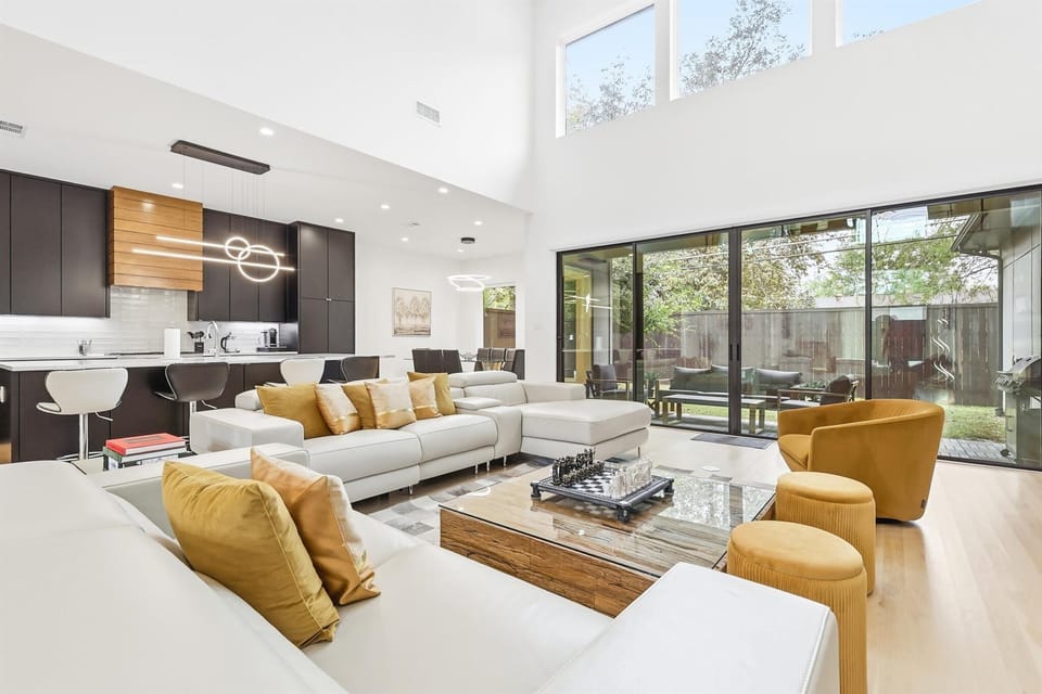 With glass patio doors, oversized furniture, and an electric fireplace, this living room’s beautiful furnishings offer a comfortable space for you to truly be yourself.