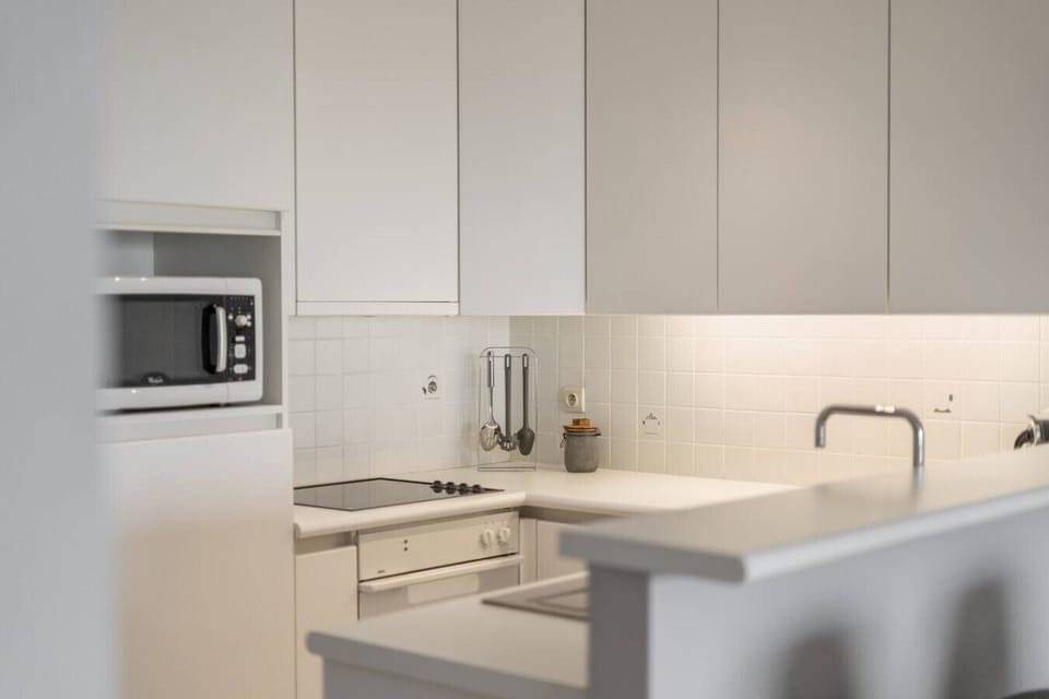 Kitchen with kitchen utensils and utilities
