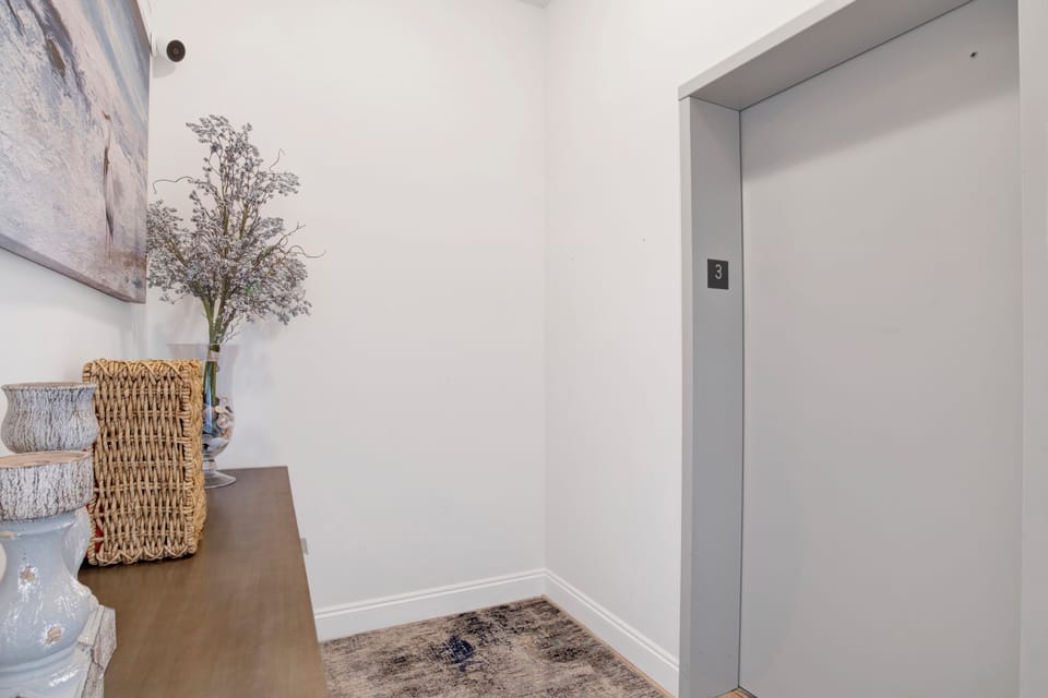 Shared elevator that will take you to the main living floor with a private entrance