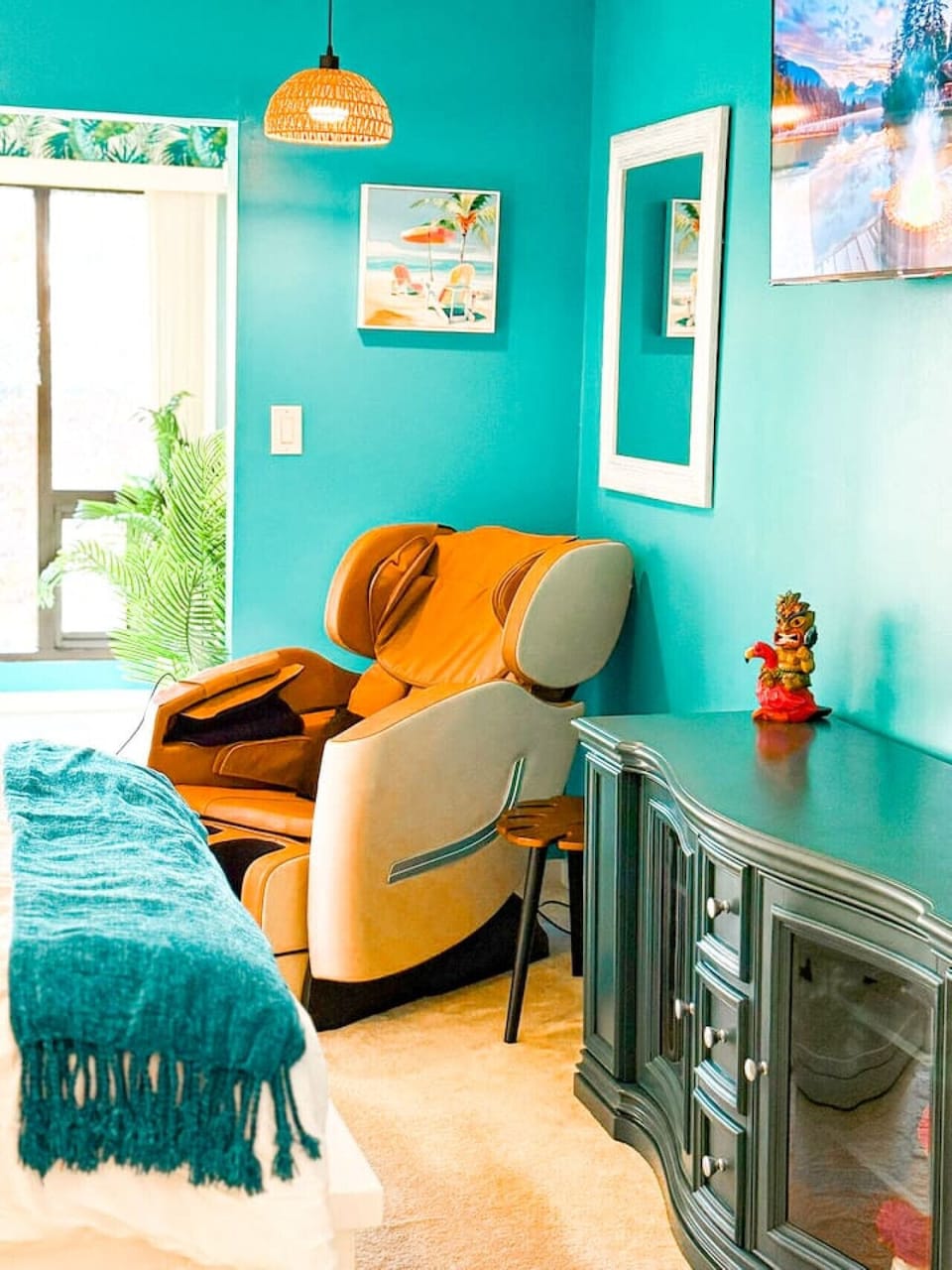 Cozy corner with a relaxing massage chair and stylish decor.