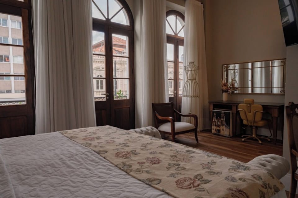 Breathe in city light and enjoy the suite’s airy proportions.