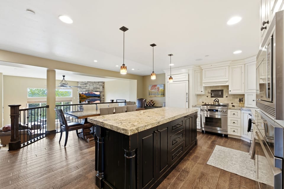 Gourmet Kitchen features premium appliances, double ovens, and ample counter space for easy meal prep and entertaining.
