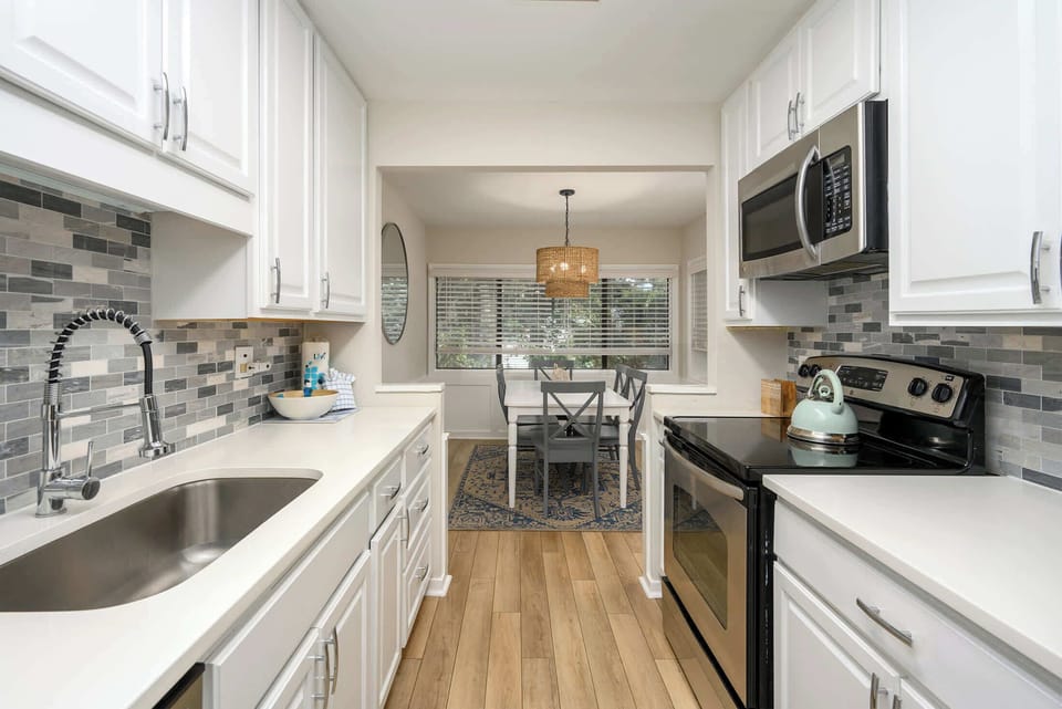 Bright, Modern Galley Kitchen with Full Appliances & Dishwasher