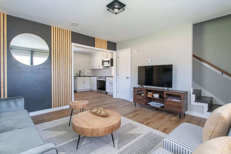 Living Room Retreat: Stylish space with vibrant decor, perfect for relaxation and entertainment!
