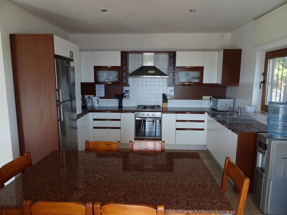 Indoor dining area within kitchen