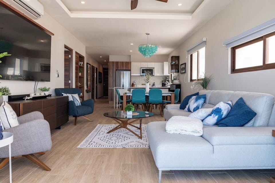 Stretch out on the plush sofa with a good book, or gather with loved ones for lively conversations in this inviting living space.