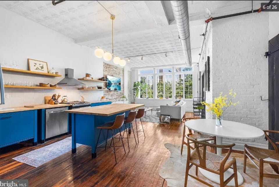 3 bar stools just beside living room