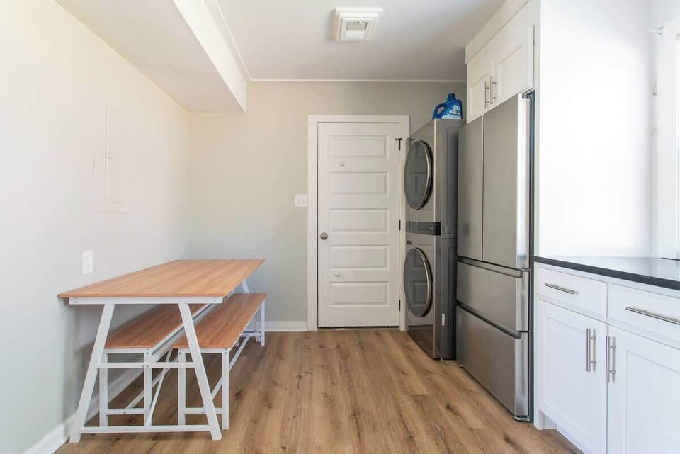 Dining Area: Enjoy meals on a table the comfortably seats 4-6 people, or use it as a desk for remote working!