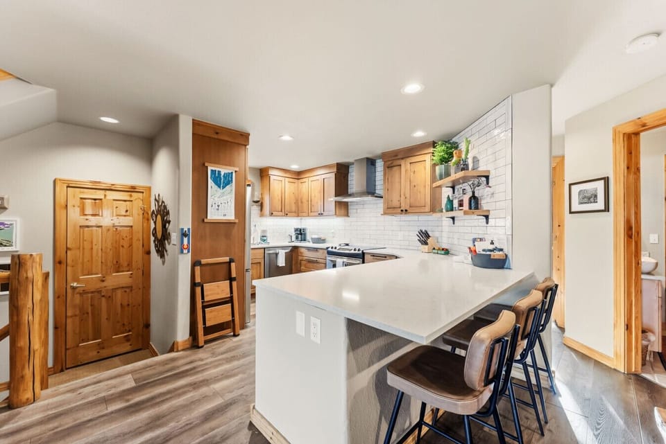The updated kitchen has plenty of counter space to cook all of your favorite meals.