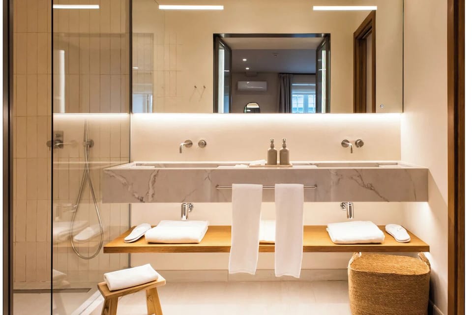 Refresh at the double vanity with spa-like lighting and space.